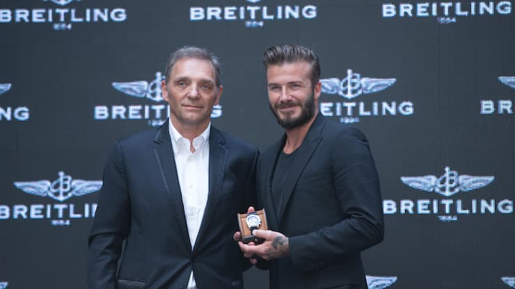 BEIJING, CHINA - JUNE 12:  (CHINA OUT) President and CEO of Breitling SA Theodore Schneider (L) and David Beckham attend a commerical event on June 12, 2014 in Beijng, China.  (Photo by VCG/VCG via Getty Images)