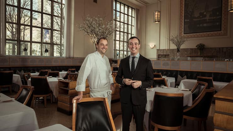 Daniel Humm, left, Eleven Madison Park's chef, and his business partner, Will Guidara, at the restaurant in New York, Feb. 13, 2017. 