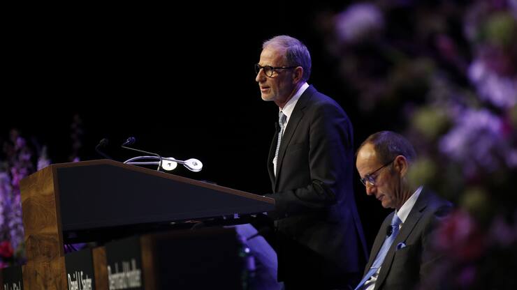Bernhard Hodler, chief executive officer of Julius Baer Group Ltd., left, speaks as Daniel Sauter, chairman of Julius Baer Group Ltd., listens during the company's annual general meeting (AGM) in Zurich, Switzerland, on Wednesday, April 11, 2018. Swiss financial regulator, Finma, is conducting enforcement proceeding against Julius Baer, the newspaper NZZ reported. Photographer: Stefan Wermuth/Bloomberg
