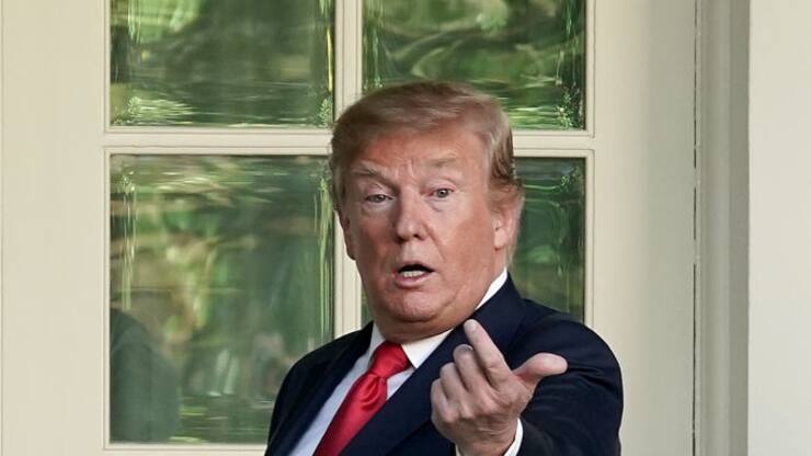 WASHINGTON, DC - MAY 06: U.S. President Donald Trump invites a guest into the Oval Office after presenting professional golfer and business partner Tiger Woods with the Medal of Freedom during a ceremony in the Rose Garden at the White House May 06, 2019 in Washington, DC. Trump announced he would give the nationâs highest civilian honor to Woods, 43, in honor of his Masters victory last month.  (Photo by Chip Somodevilla/Getty Images)