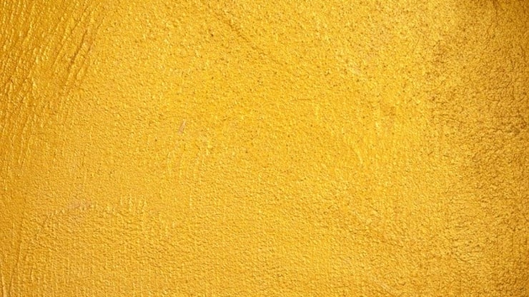 Beton mit Goldfarbe