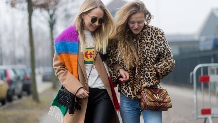 Juliane Diesner wearing a white Gucci shirt, black Gucci bag, beige coat and Marie von Behrens wearing a leoprint jacket, Louis Vuitton bag outside By Malene Birger during the Copenhagen Fashion Week Autumn/Winter 17 on February 2, 2017 in Copenhagen, Denmark. (Photo by Christian Vierig/Getty Images)