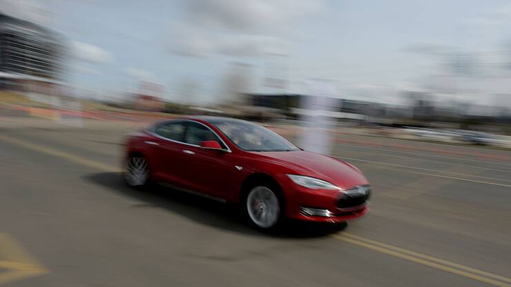 DEVER, CO. - MARCH 13: Clients and media were offered an opportunity to drive the Tesla Motors P85D Model S during a demonstration at Sports Authority Field in Denver, CO  March 13, 2015. Teslas electric motor has instant torque, allowing the vehicle to accelerate from 0 to 60 mph in 3.2 seconds. (Photo By Craig F. Walker / The Denver Post)