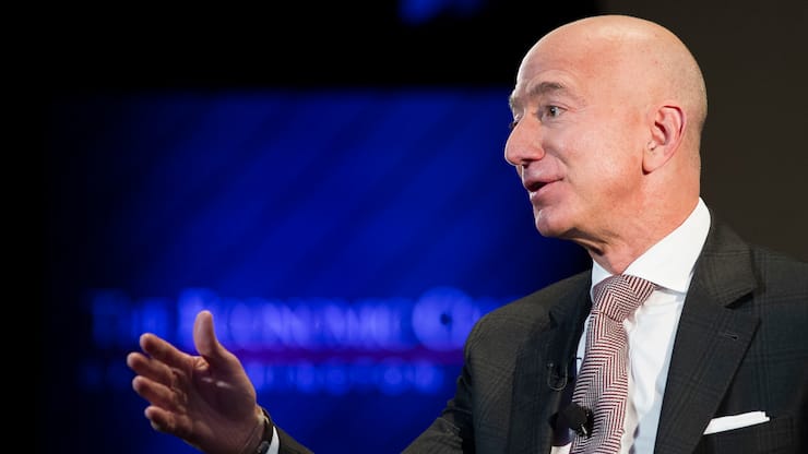 FILE- In this Sept. 13, 2018, file photo Jeff Bezos, Amazon founder and CEO, speaks at The Economic Club of Washington's Milestone Celebration in Washington. Back in 2013, Jeff Bezos went on â60 Minutesâ to share his vision of the future: Drones would be delivering Amazon packages in five years. It hasnât happened. (AP Photo/Cliff Owen, File)