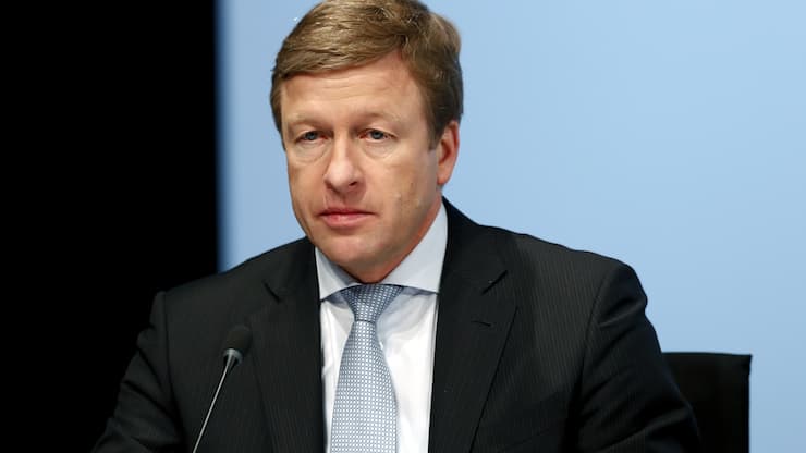 FILE - In this March 21, 2018, file photo member of the board of the German car manufacturer BMW, Oliver Zipse, attends the earnings press conference in Munich, Germany. On Thursday, July 18, 2019, BMW named its top production manager, Zipse, as its next CEO to lead the luxury automaker. (AP Photo/Matthias Schrader, File)