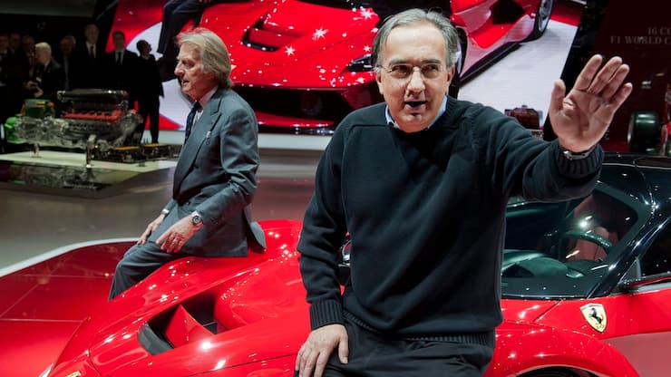 Ferrari CEO Luca Cordero di Montezemolo, left with Sergio Marchionne, CEO Fiat Spa, right, during the press day at the 83rd Geneva International Motor Show in Geneva, Switzerland, Tuesday, March 5, 2013. The Motor Show will open its gates to the public from 7th to 17th March presenting more than 260 exhibitors and more than 130 world and European premieres. (KEYSTONE/Sandro Campardo)