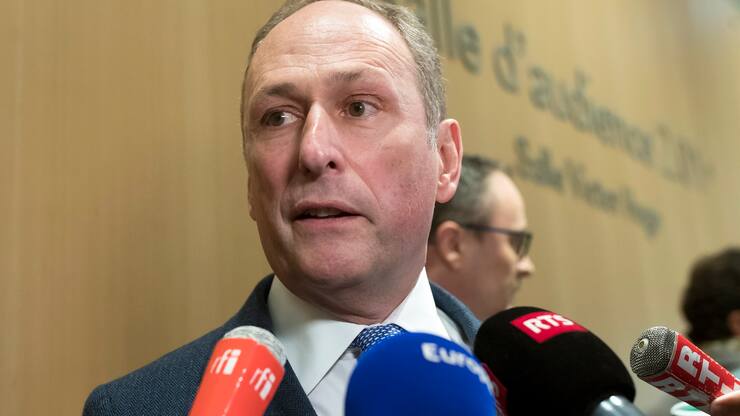 epa07382736 UBS legal expert Markus Diethelm speaks to media at the courthouse in Paris, France, 20 February 2019, after the trial verdict of Swiss Bank UBS over allegations it established a wide-ranging tax fraud scheme involving billions of euros. According to reports, the Swiss Bank UBS was found guilty and has to pay 3.7 billion euros fine.  EPA/IAN LANGSDON
