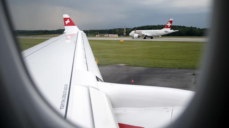 An aircraft (Bombardier CS100 HB-JBB) of the Swiss International Air Lines is pictured from a Bombardier CS300 aircraft from Swiss International Air Lines, during an official inauguration at the Geneve Aeroport, in Geneva, Switzerland, Wednesday, June 14, 2017. (KEYSTONE/Salvatore Di Nolfi)