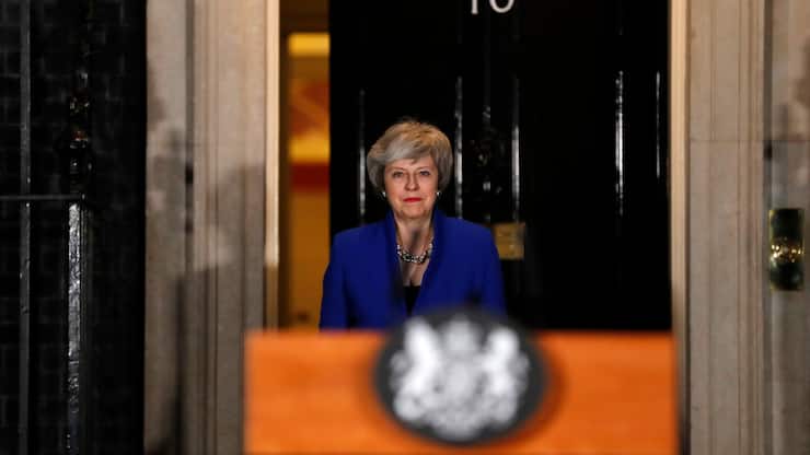 British Prime Minister Theresa May arrives to speak outside 10 Downing street in London, Wednesday, Jan. 16, 2019. May's government survived a no-confidence vote Wednesday called after May's Brexit deal was overwhelmingly rejected by lawmakers. (AP Photo/Frank Augstein)
