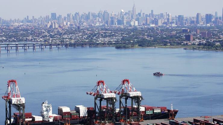 A container ship is docked at Maher Terminals, Monday, Sept. 8, 2008 in Elizabeth, N.J. The New York City skyline is behind. The Commerce Department says the trade deficit rose by 5.7 percent to $62.2 billion in July, much worse than the $58 billion deficit that Wall Street expected. It pushed the gap between what America imports and what it sells abroad to the highest level since March 2007. (AP Photo/Mark Lennihan)