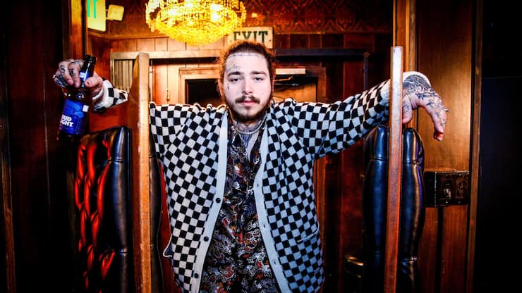 Post Malone behind the scenes before his Bud Light Dive Bar Tour show in Nashville at Footsies Dive Bar on March 20, 2018 in Los Angeles, California. (Photo by Rich Fury/Getty Images for Bud Light)