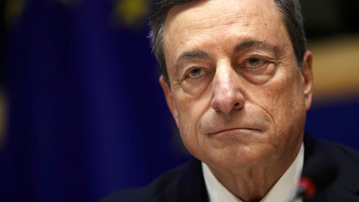 European Central Bank President Mario Draghi listens to a speech during an Economic and Monetary Affairs meeting at the European Parliament in Brussels, Monday, Nov. 26, 2018. (AP Photo/Francisco Seco)
