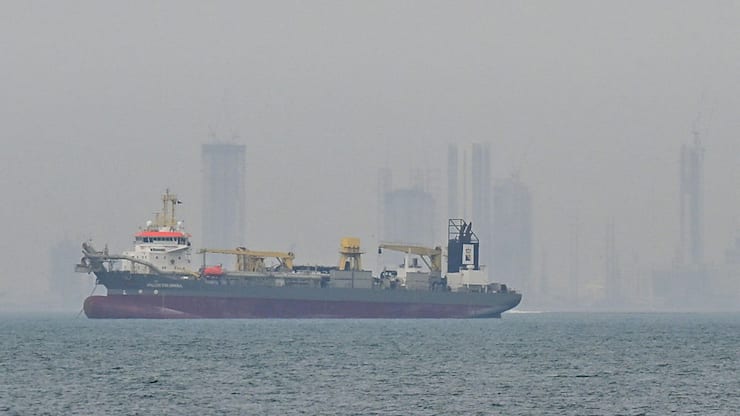 Commercial vessels anchored off UAE coast near Strait of Hormuz