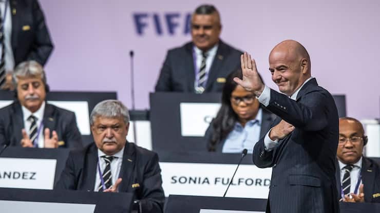 epa07627229 FIFA president Gianni Infantino (R) reacts after been re-elected for a second term as the head of FIFA during the 69th FIFA Congress in Paris, France, 05 June 2019. EPA/CHRISTOPHE PETIT TESSON
