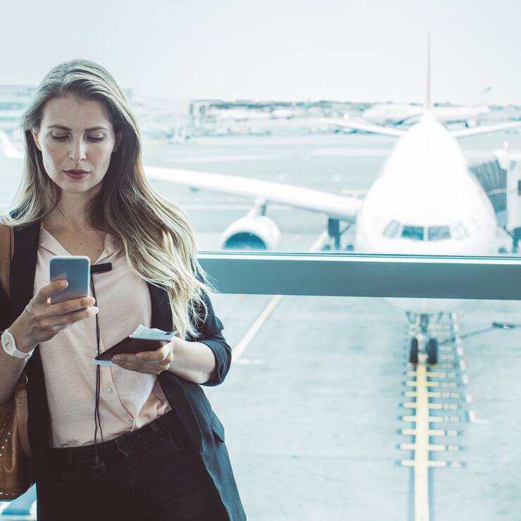 Woman at airport waiting area