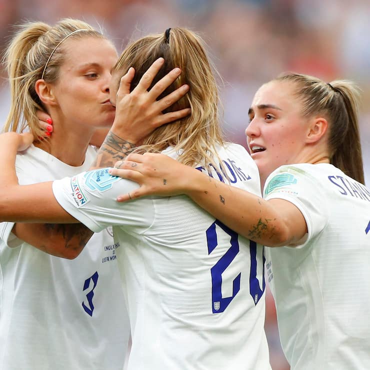 LONDON, ENGLAND - JULY 31: Ella Toone of England celebrates with teammates Rachel Daly and Georgia Stanway after scoring their team's first goal during the UEFA Women's Euro 2022 final match between England and Germany at Wembley Stadium on July 31, 2022 in London, England. (Photo by Lynne Cameron - The FA/The FA via Getty Images)