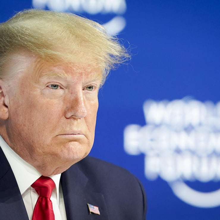 US President Donald Trump waits on stage before addressing a plenary session during to the 50th annual meeting of the World Economic Forum, WEF, in Davos, Switzerland, Tuesday, January 21, 2020. The meeting brings together entrepreneurs, scientists, corporate and political leaders in Davos from January 21 to 24. (KEYSTONE/Gian Ehrenzeller)
