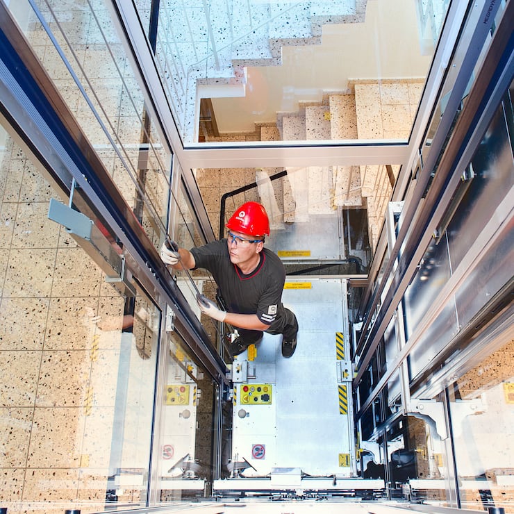 Fitter in elevator in Jona, Switzerland