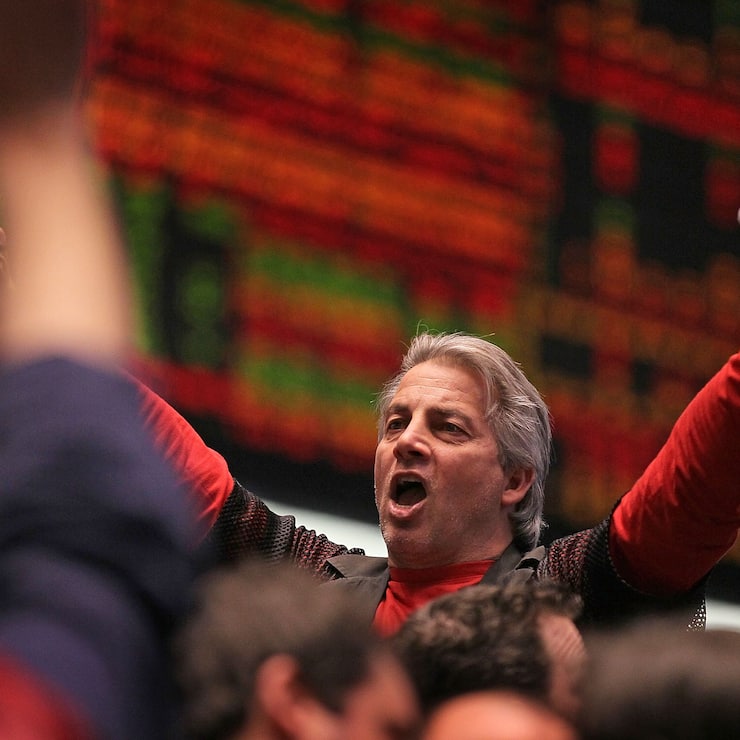 CHICAGO, IL - DECEMBER 14:  A trader signals an offer in the Standard & Poors 500 stock index futures pit at the CME Group December 14, 2010 in Chicago City. The S&P stock index was up in afternoon trade after the Federal Open Market Committee held the key policy rate near zero while keeping the size of Treasury-bond buying program at $600 billion hoping to stimulate an economic recovery.  (Photo by Scott Olson/Getty Images)