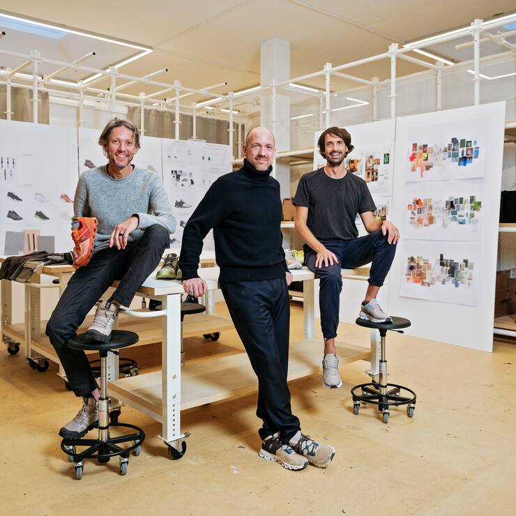 Founders of the Swiss sneaker company On, from left: Olivier Bernhard, David Allemann and Caspar Coppetti, at the company's design studio in Zurich, Nov. 12, 2019. The 20-time Grand Slam tennis champion Roger Federer is taking a big step toward life after tennis with a small Swiss running shoe brand with a cult following and global ambitions. (Samuel Zeller/The New York Times)