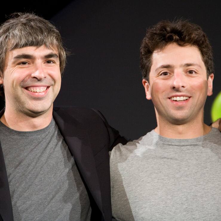 Larry Page (L) and Sergey Brin (R), the co-founders of Google, at a press event where Google and T-Mobile announced the first Android powered cellphone, the T-Mobile G1. (Photo by James Leynse/Corbis via Getty Images)