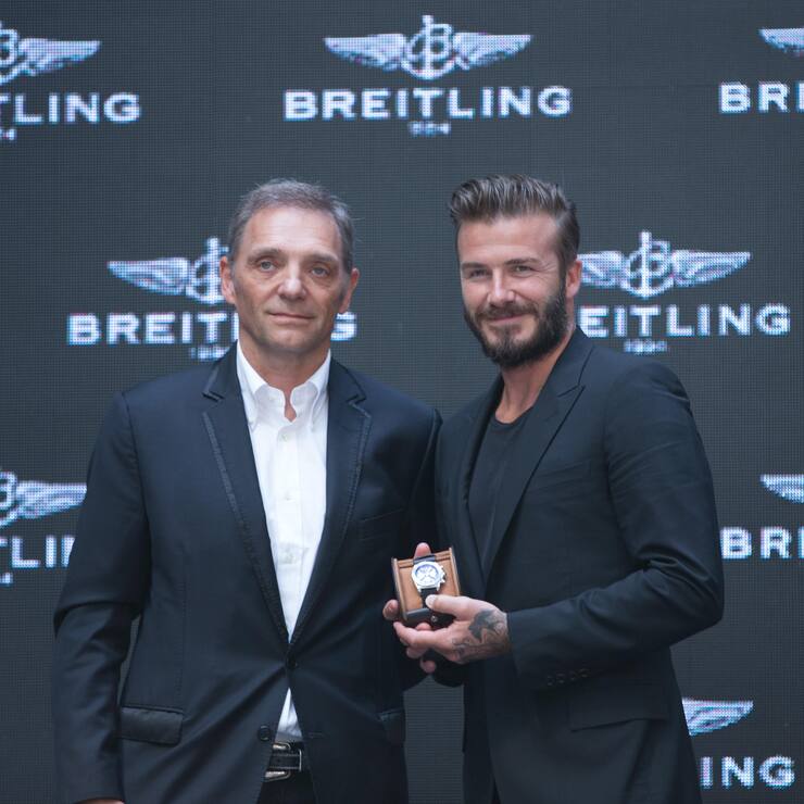 BEIJING, CHINA - JUNE 12:  (CHINA OUT) President and CEO of Breitling SA Theodore Schneider (L) and David Beckham attend a commerical event on June 12, 2014 in Beijng, China.  (Photo by VCG/VCG via Getty Images)
