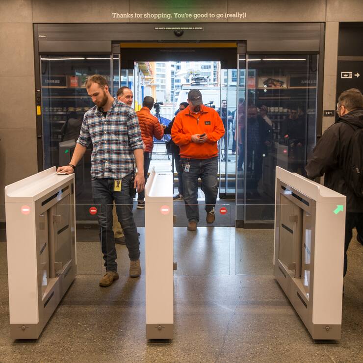 SEATTLE, WA - JANUARY 22: Shoppers enter and check out with purchases at the Amazon Go, on January 22, 2018 in Seattle, Washington. After more than a year in beta Amazon opened the cashier-less store to the public. (Photo by Stephen Brashear/Getty Images)