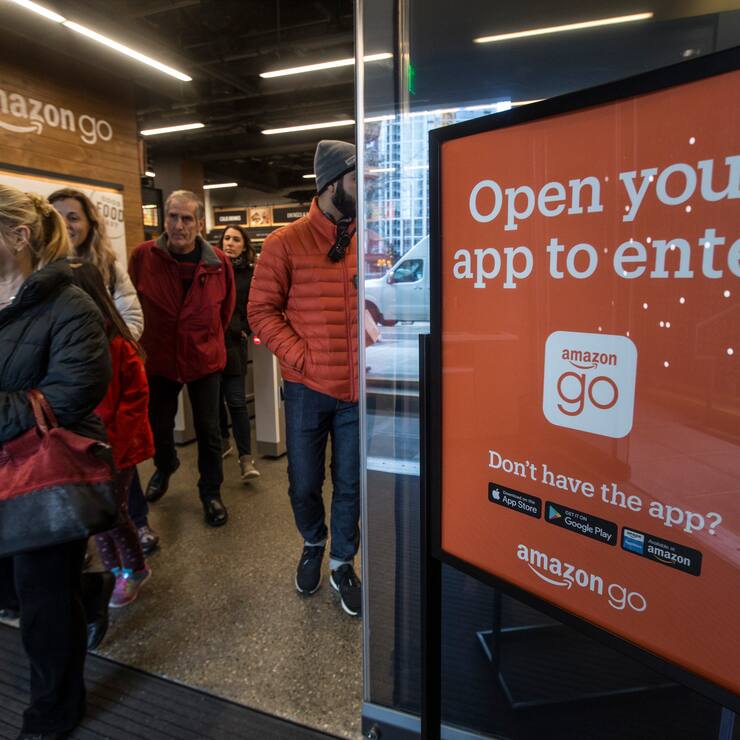 SEATTLE, WA - JANUARY 22: Shoppers leave the Amazon Go store after checking out on January 22, 2018 in Seattle, Washington. After more than a year in beta, the store is open to the public. (Photo by Stephen Brashear/Getty Images)