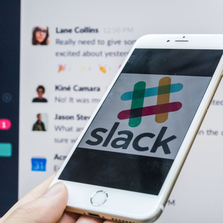 HONG KONG, HONG KONG - JANUARY 11:  In this photo illustration, a young man is using an iPhone as he uses Slack on January 11, 2018 in Hong Kong, Hong Kong. (Photo by S3studio/Getty Images)