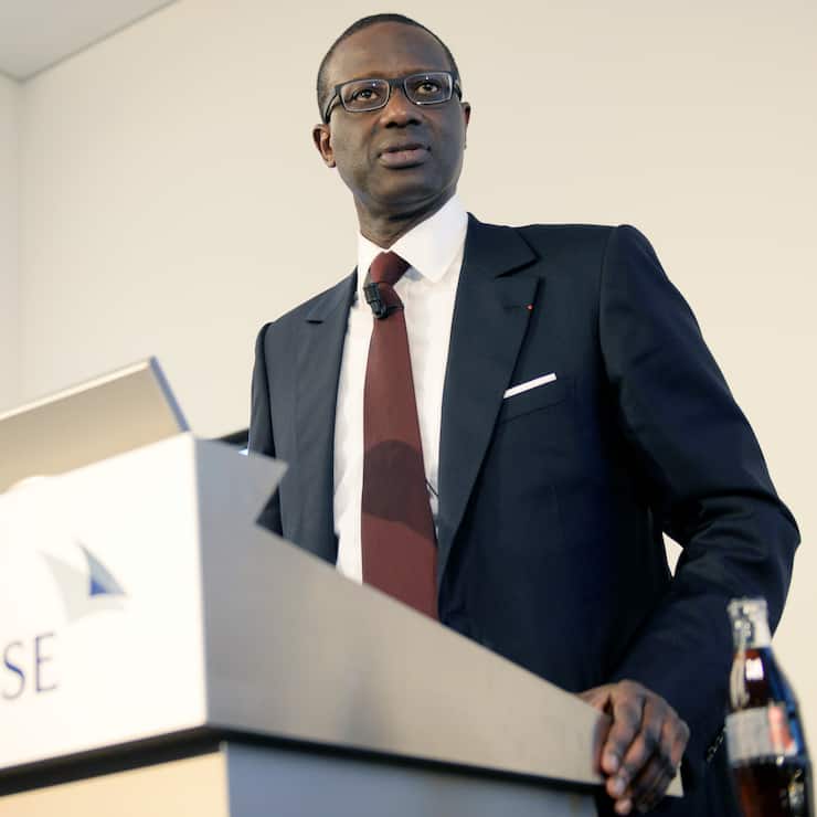 Tidjane Thiam, current head of British insurer Prudential, left, speaks during a press conference of Swiss Bank Credit Suisse in Zurich, Switzerland, Tuesday, 10 March 2015. The Board of Directors of Credit Suisse Group AG today has appointed Tidjane Thiam as the new CEO. He will take over this position from Brady W. Dougan, who will step down at the end of June 2015 after eight years as CEO of Credit Suisse Group. (KEYSTONE/Walter Bieri)