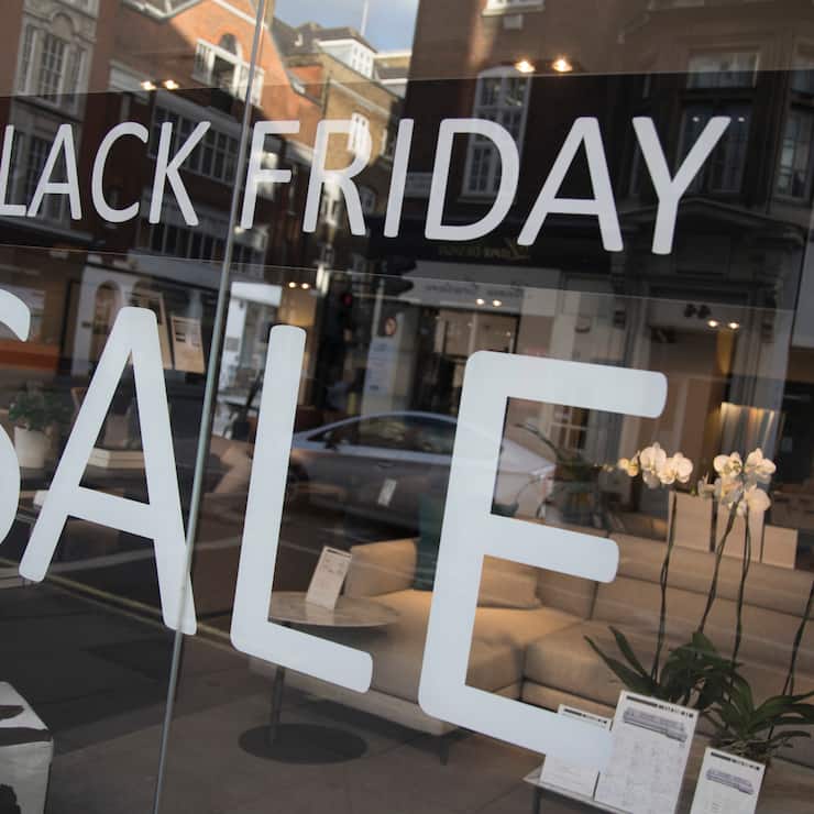 Shoppers on Oxford Street in central London with a sign advertising Black Friday in a shop window on 25th November 2017 in London, England, United Kingdom. This is the busiest shopping district in the capital with Oxford Street being Europe's busiest shopping area. (photo by Mike Kemp/In Pictures via Getty Images)