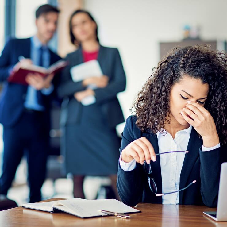 Burnout businesswoman under pressure in the office