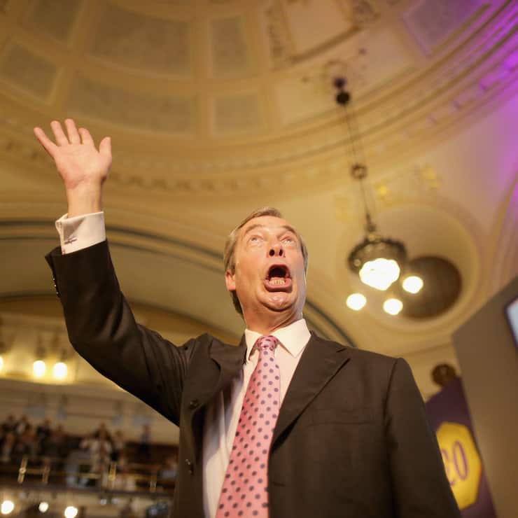 LONDON, ENGLAND - SEPTEMBER 20:  Leader of UKIP Nigel Farage takes the applause after addressing delegates during his keynote speech on September 20, 2013 in London, England. Members of the United Kingdom Independent Party have gathered at Central Hall, Westminster for the annual conference. Nigel Farage has predicted that the party will come first in next year's European elections, saying it is "growing up" after success in local elections.  (Photo by Christopher Furlong/Getty Images)