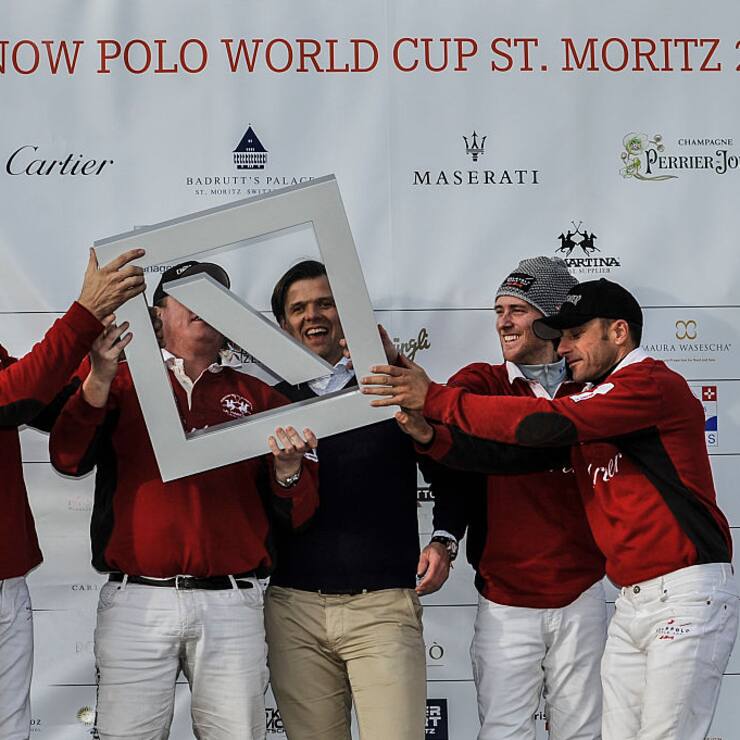 January 28th 2017, Engadin valley, St Moritz, Switzerland; Carsten Kahl of Deutsche Bank on the podium with Team Cartier as they celebrate the victory during Polo Game 4 at Snow Polo World Cup;  (Photo by Gaetano Piazzolla/Action Plus via Getty Images)