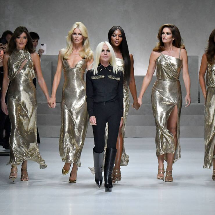 Carla Bruni, Claudia Schiffer, Donatella Versace, Naomi Campbell, Cindy Crawford and Helena Christensen walks the runway at the Versace Ready to Wear Spring/Summer 2018 fashion show during Milan Fashion Week Spring/Summer 2018 on September 22, 2017 in Milan, Italy. (Photo by Victor VIRGILE/Gamma-Rapho via Getty Images)