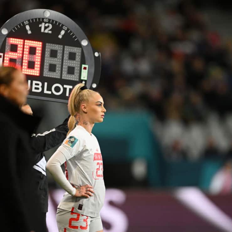 DUNEDIN, NEW ZEALAND - JULY 21: Alisha Lehmann of Switzerland stands on the sideline before brought in for Ramona Bachmann (not pictured) during the FIFA Women's World Cup Australia & New Zealand 2023 Group A match between Philippines and Switzerland at Dunedin Stadium on July 21, 2023 in Dunedin / Åtepoti, New Zealand. (Photo by Joe Allison - FIFA/FIFA via Getty Images)