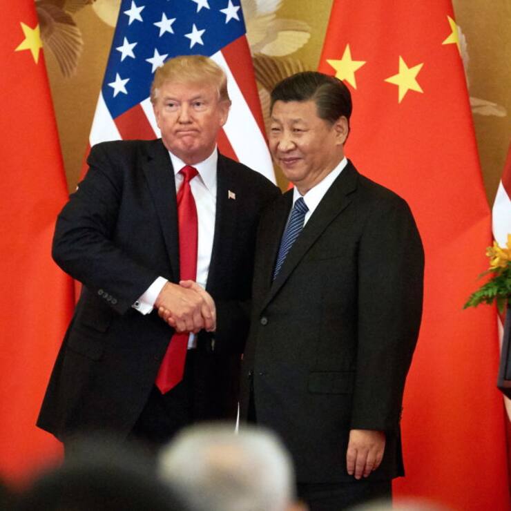 US President Donald Trump (L) and China's President Xi Jinping shake hands at a press conference following their meeting at the Great Hall of the People in Beijing. Artyom Ivanov/TASS (Photo by Artyom Ivanov\TASS via Getty Images)