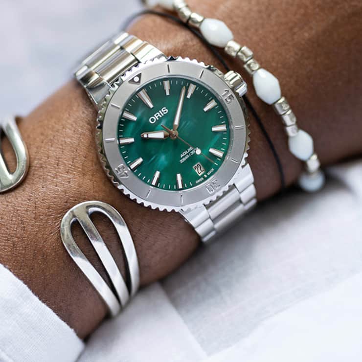 Sonderedition der Oris Aquis Date: Mit einem Zifferblatt aus recycelten Fischernetzen.