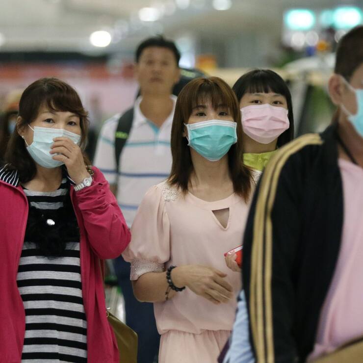 Thailands Hauptstädter tragen jetzt Maske