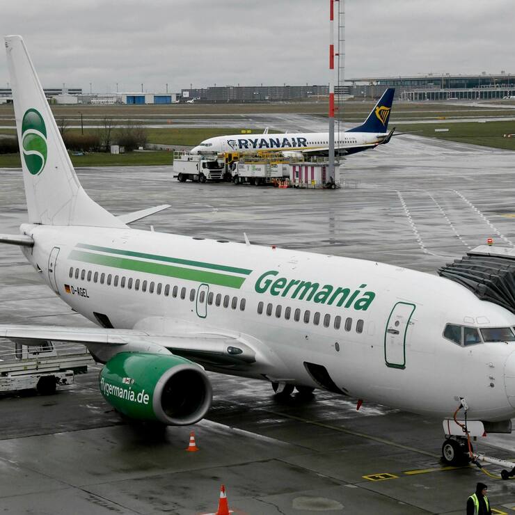 aircraft of German Germania airline is parked at Schoenefeld airport near Berlin. Germania has applied for insolvency. (Bernd Settnik/dpa via AP)