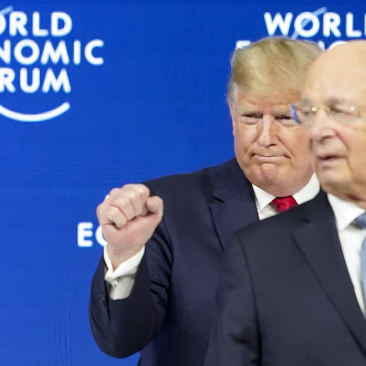 US President Donald Trump, left, and German Klaus Schwab, right, Founder and Executive Chairman of the World Economic Forum, WEF, leave the stage after addressing a plenary session during to the 50th annual meeting of the World Economic Forum, WEF, in Davos, Switzerland, Tuesday, January 21, 2020. The meeting brings together entrepreneurs, scientists, corporate and political leaders in Davos from January 21 to 24. (KEYSTONE/Gian Ehrenzeller)