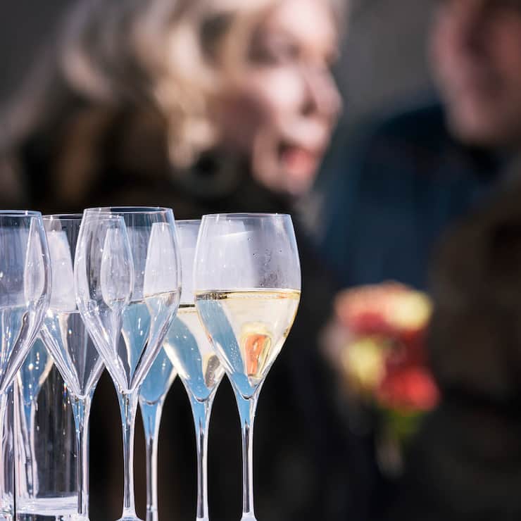 Empty and full glasses pictured at the White Turf horse race, which takes place every winter on the frozen Lake St. Moritz, in St. Moritz, Canton of Grisons, Switzerland, on February 19, 2017. (KEYSTONE/Christian Beutler)
