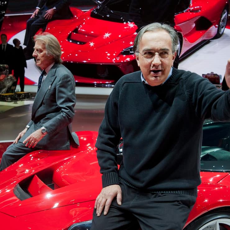 Ferrari CEO Luca Cordero di Montezemolo, left with Sergio Marchionne, CEO Fiat Spa, right, during the press day at the 83rd Geneva International Motor Show in Geneva, Switzerland, Tuesday, March 5, 2013. The Motor Show will open its gates to the public from 7th to 17th March presenting more than 260 exhibitors and more than 130 world and European premieres. (KEYSTONE/Sandro Campardo)