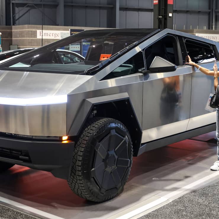 epa11138406 A Tesla 2025 Cybertruck is on display at the 2024 Chicago Auto Show in Chicago, Illinois, USA, 08 February 2024. The annual showcase for automotive manufacturers is the largest auto show in the United States. EPA/ALEX WROBLEWSKI