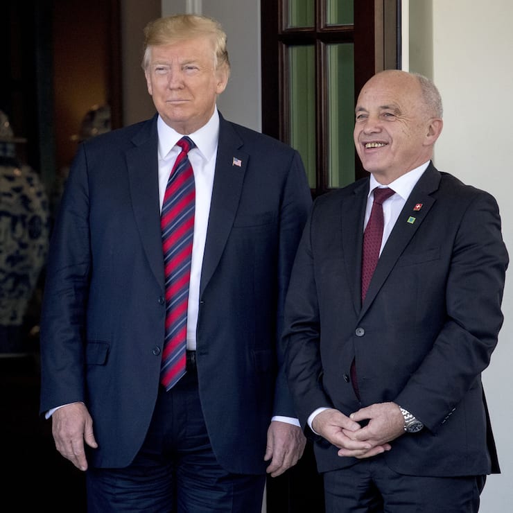 President Donald Trump welcomes Switzerland's Federal President Ueli Maurer, right, to the White House, Thursday, May 16, 2019, in Washington. (AP Photo/Andrew Harnik)