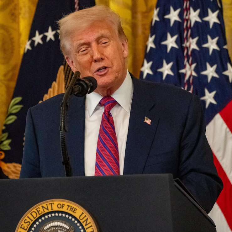 President Trump signs the GENIUS cryptocurrency bill at the White House on July 18, 2025. (Photo by Andrew Leyden/NurPhoto)