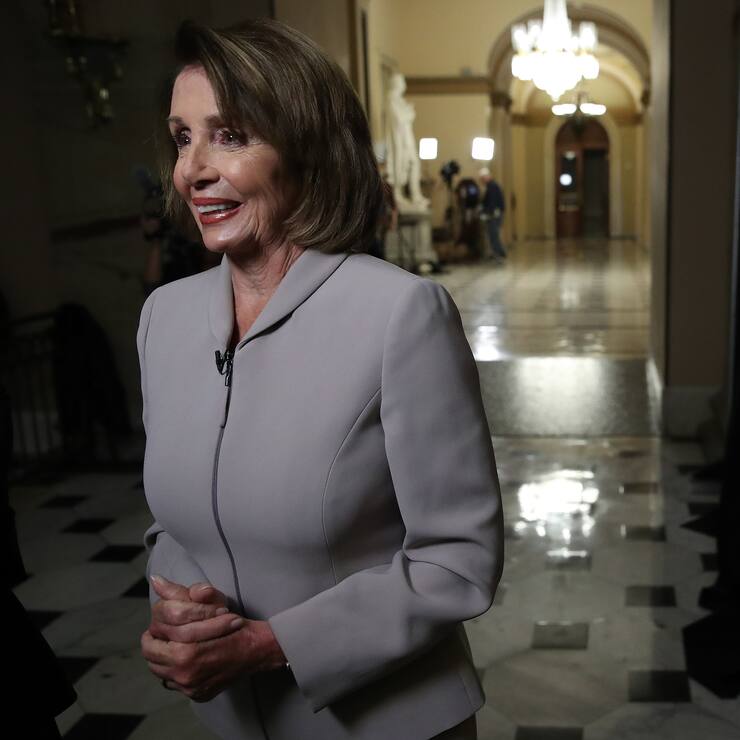 WASHINGTON, DC - JANUARY 02: House Democratic Leader Nancy Pelosi (D-CA) is interviewed while walking through the U.S. Capitol on January 02, 2019 in Washington, DC. Pelosi, who is scheduled to become the next Speaker of the House tomorrow, will meet with other leaders of Congress and U.S. President Donald Trump at the White House later today to discuss border security and ending the partial shutdown of the U.S. government. (Photo by Win McNamee/Getty Images)