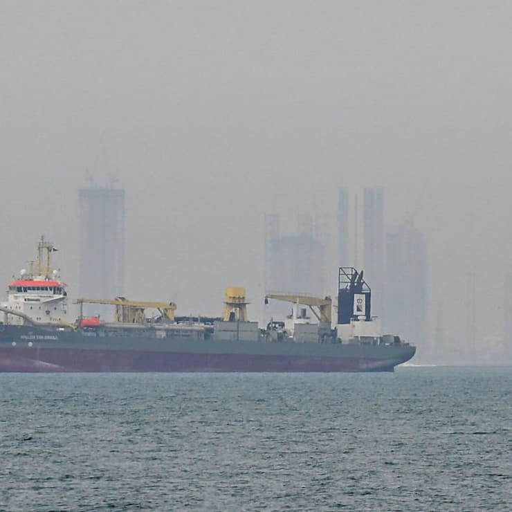 Commercial vessels anchored off UAE coast near Strait of Hormuz