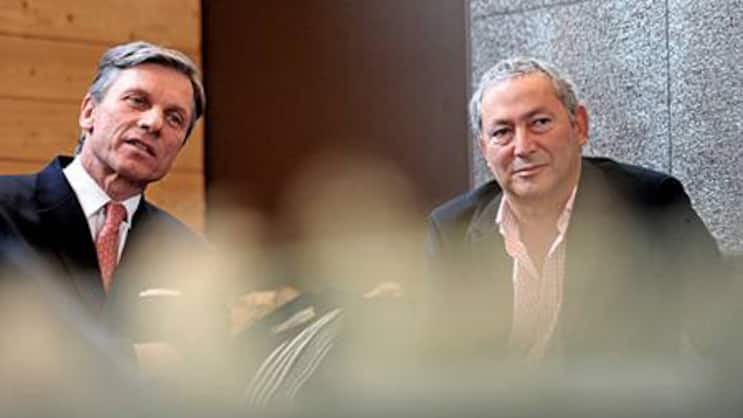 Bauen im Konzern ab – und in Montenegro auf: Orascom-Chefs Gerhard Niesslein (l.), Samih Sawiris.