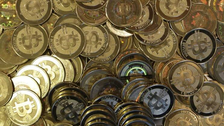 Bitcoin Tokens: Die digitale Währung soll in der Schweiz etabliert werden. (Bild: Keystone)